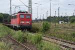 BR 140 Lokportraits 140 261-9 kurz vor dem Seelzer Rbf. am 07.07.2009 dabei zog sie,leere Flachwagen.