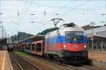 br-1116-vor-guterzugen Leerganzzug 46574 mit Russland-EM-Lok - 1116.084 - am 7. Juli 2009 auf der Fahrt nach Breclav w�hrend seiner Durchfahrt im Bf. Amstetten.