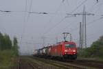 185 228-4 mit Containerzug in Lintorf am 14.04.2009  ...