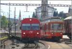 ABt 116 und Be 4/8 23 begenen sich im Nebenbahnhof ...