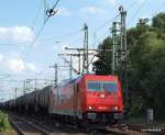 185 630-1 der HGK bei der Durchfahrt mit einem leeren ... 185 630-1 der HGK bei der Durchfahrt mit einem leeren ...