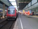 Zwei RE`s in Stuttgart Hbf.
Links RE nach Mosbach-Neckarelz und rechts ...