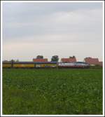 TX Logistik AG Hier die Werbung f�r Rostock Port (185 513 -9 ) mit G�tern der gerade durch K�fering f�hrt und danach in Regensburg Ost halten wird. 