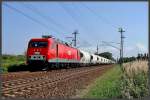 mitteldeutschen-eisenbahngesellschaft-meg MEG 801 mit einem Zementzugumleiter aus R�dersdorf kurz vor Stralsund.  am 01.07.09