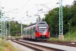 br-4124 4124 022 als Regionalexpress von Wien S�d nach Deutschkreutz, bei der Einfahrt in den Bahnhof M�llendorf, 28.07.2009.