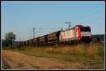 br-185-private 185-CL 003 zieht den samst�glichen Sandzug nach Neuburg(Donau). In den letzten Sonnenstrahlen des 1.8.2009 ist sie bei L�tzelsachsen unterwegs Richtung S�den