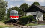 Steuerwagen Bauart Karlsruhe Eine RE nach Kiel Hbf, geschoben von 218 453-9, passiert am 31.07.2009 einen Bahn�bergang zwischen Pl�n und Ascheberg. 