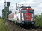Die Science 110 325-8 mit einem Autoreisezug in K�ln-Porz Wahn ...