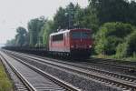 155 023-5 mit einem langen G�terzug,kurz vor der Durchfahrt des ...