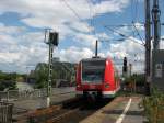 br-423 423 038-9 war am 24. Juli 2009 auf der S 13 (Troisdorf - K�ln-Hansaring) unterwegs. Hier beim Verlassen der Hohenzollernbr�cke und der Einfahrt in den Hbf von K�ln.