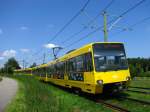 Mit Werbung f�r die Wilhelma ist DT.8 3141 zwischen Heumaden ...