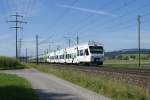 Der weisse RABe 525 038-6 befindet sich am 5.8.09 zusammen ...