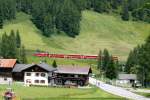 strecke-prattigau-lq-da RhB - Regio-Express 1040 von Davos Platz nach Landquart am 20.07.2009 bei Davos-Oberlaret mit BDt 1757 - B 2351 - B 2293 - A 1249 - E-Lok Ge 4/4 II 627
