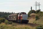 br-211-db-v-100 Lok 1152 der CFL Cargo poltert am 6.08.09 mit einem Schiebewandwagenzug aus Westerland/Sylt durch die Fotokurve bei Morsum auf den Hindenburgdamm, um Richtung Nieb�ll zugelangen.