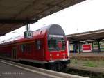 doppelstock-steuerwagen-ex-dr Einer der wenigen verkehrsroten Steuerwagen der Bauart DABbuzf777 am 11.07.01 im Bahnhof Dessau. Dieser Wagen verkehrt vereinzelt auf der RE3 Dessau - Berlin - Angerm�nde.