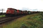 canadian-national-cn 5296 und 5286 mit G�terzug (62 wagons) bei Thunder Bay am 02-08-1993. Bild und scan: Date Jan de Vries.