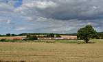 218 413-3 schiebt am ...  Julian D�ll 22.08.2009