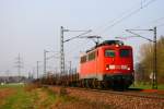 BR 140 mit Zugen 140 830 f�hrt an einem Aprilabend durch die Lande. Aufgenommen mit einem Rungenwagenzug aus dem Pfinztal bei Ettlingen.
