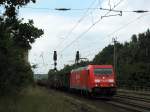 BR 185 mit Zugen 185 254-0 mit einem gemischten G�terzug am 17.08 durch Saarmund.