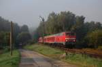 BR 218 mit Zugen 218 454 mit RE 351 'Jan Hus' am fr�hen nebligen Morgen des 23.08.2009 am ESiG Furth im Wald. Wagenreihung: Aimz - Bimz - Aimz