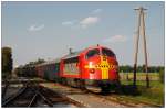 auslandische-zuge Sonderzug D 16749 von Augsburg nach Sopron, bespannt mit V 170.1125 (MY 1125) der Firma Eichholz Rail GmbH am 21.8.2009 bei der Einfahrt in den Bahnhof Traiskirchen/Aspangbahn. Mein Dank geb�hrt dem Fahrdienstleiter von Traiskirchen, der den Zug, nicht so wie er geplant hatte am Durchfahrtsgleis, sondern am �u�ersten Gleis f�r uns einfahren lies. Bei Sonderfahrten wird der STRAGAB Firmenschriftzug mit einem SANTA FE Schriftzug �berklebt.
