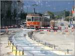 ASm Aare Seeland Mobil ASm Be 4/4 303 und Bt Steuerwagen am Bahnhof Solothurn. Im Vordergrund ist das neu betonierte Trassee auf den bahnhofvorplatz zu sehen. (22.08.2009)