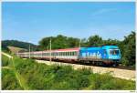 1016.023 (Kyoto) mit dem OIC545 (Innsbruck - Wien). Unter-Oberndorf, 10.8.2009. ...