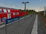 Pro Train 28 RE2 nach Cottbus beim Halt in Berlin Staaken.