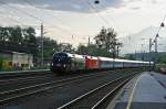 1x16-werbeloks 1116 280 und eine Schwesterlok mit OEC 161 am 19.09.2009 in Brixlegg.