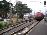 BR 218 mit Zugen 218 322-6  mit einer Regionalbahn aus Hamburg kommend kurz nach der Ankunf im bahnhof Bad oldesloe.Im hintergrund ein LINT der Nordbahn nach Neum�nster und eine unebkannte 218 schiebt eine Regionalexpress Richtung Hmaburg Hbf.(28.6.2008)