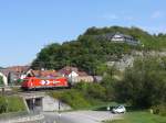 HGK Hafen - Und Guterverkehr Koln Eine 185 der Hafen und G�terverkehr K�ln mit einem Kesselwagenzug bei Retzbach, 19.08.2009