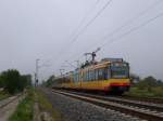 Tw 9?? + Tw 909 fahren als Eilzug der Linie ...