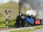 DFB Dampfbahn Furka-Bergstrecke DFB - Dampfzug mit der Lok HG 3/4 1 unterwegs in Realp am 25.09.2009