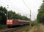 BR 143 mit Zugen 143 163-4 mit einer 30 min�tig versp�teten Regionalbahn. Zusammen mit 2 netten Radfahrern in Bestensee.
