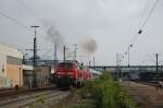 BR 218 mit Zugen Br 218 499-2 und eine Schwester fuhren mit lautem Get�se mit einem IC von Oberstorf im Bahnhof G�ppingen an, 19.09.2009