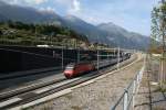 re-460-mit-zugen Re 460 064 am Nordportal des L�tschbergBasisTunnels. Aufgenommen am 28.09.2009.