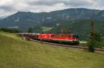 br-1142 29.7.09 Der Semmering bietet immer wieder eine nette Abwechslung, ganz speziell f�r 1x42 interessierte! Die ehemalige T�rkei EM Lok, 1116 031 brachte einen Suzuki Ganzzug nach Gloggnitz, wo ihr eine 1142 �ber den Berg half. Hier die 1142 669 mit der 1116 031 am GAG 48141 von Hegyeshalom nach Tarvisio Boscoverde.
