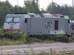 ITL Eisenbahngesellschaft mbH 'In der Botanik' des weitl�ufigen Cuxhavener-Bahnhofgel�ndes ruht ITL-Lok_92801285103-8; Irgendwie schade, da� der Bahnhof wom�glich schon bald ganz von der Natur verdeckt sein wird!(Aufnahmepunkt Bahnsteig1/2);090902