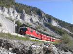 RE1224 nach Disentis mit Ge 4/4 II 613 Domat/Ems duckt ...