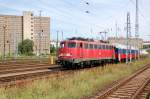 BR 115 115 336 bringt am 29.07.09 einen russischen Wagen ins Bw Lichtenberg. Fotografiert vom Bahnhof aus.