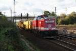 Uwe Adam Eisenbahnverkehrsunternehmen V100 von Uwe Adam fuhr mit einem kurzen Bauzug am Haken,am 12.10.2009 in Richtung Seelze,fotografiert zwischen Wunstorf/Seelze.