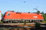 1116 185-8 im Schiebedienst an EC 113. (Mai 09, Bickenbach). ...