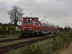 BR 218 mit Zugen Die 218 466 mit dem IC Rottalerland (au�erplanm��ig mit drei Dostos) am 17.010.2009 bei der Ausfahrt aus Pfarrkirchen.