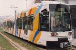 dusseldorf NF6 2111 Rheinbahn D�sseldorf 1996 in nagelneuem Zustand auf Linienfahrt durch die Stadt. Mit Vollwerbung f�r 100 Jahre Rheinbahn. Gleichzeitig war dies die letzte in D�sseldorf von der Duewag gebaute Stra�enbahnserie. Ein paar Jahre sp�ter kam dann das Ende f�r das Werk im Stadtteil Lierenfeld.