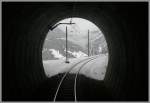 Winterimpressionen zwischen Davos und Klosters. Licht am Ende des Tunnels. ...