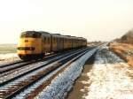 144 mit Regionalzug 8337 Groningen-Nieuweschans bei Kropswolde am 30-1-1993. Bild ... 144 mit Regionalzug 8337 Groningen-Nieuweschans bei Kropswolde am 30-1-1993. Bild ...