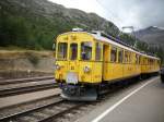 ABe 4/4 34 von 1908 im Bahnhof Bernina-Suot  ...