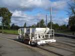 Ein Schotterwagen der Firma Eichholz-Rail steht auf der Schleife Leipzig-Miltitz. ...