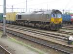 br-266-class-66---jt42cwr DE 6307 der DLC vor einem Containerzug in Venlo.