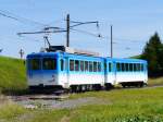 RB Rigi Bahnen RB - Bei der Talfahrt Zug nach Arth-Goldau mit dem Zahnradtriebwagen Bhe 2/4 11 und Steuerwagen Bt 21 am 07.09.2009
